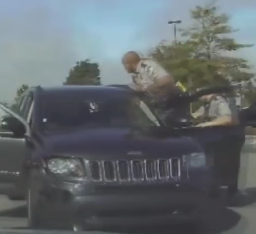 DASHCAM: Woman Drags Officers, Leads Wild Chase
