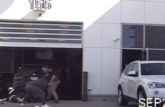 DASHCAM: Suspect Shoots Two Officers at Car Dealership